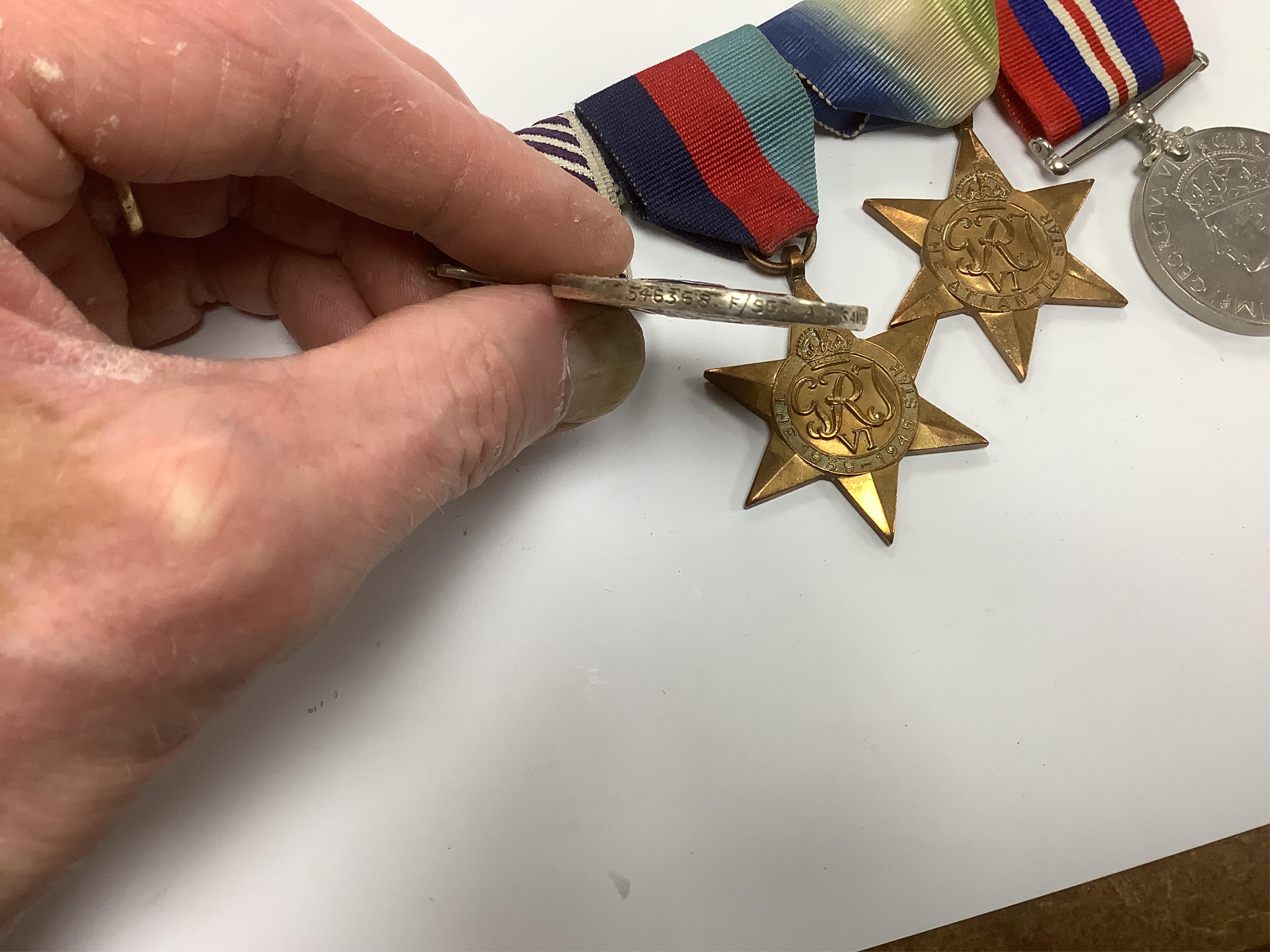 A Distinguished Flying Medal group awarded to Flight Sergeant A. Savage, comprising of the Distinguished Flying Medal together with the Atlantic Star, the 1939-1945 Star and the War Medal
